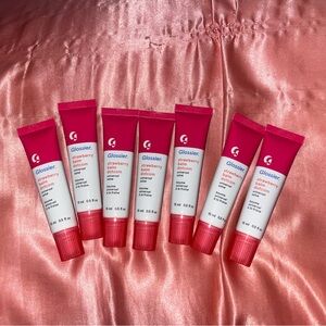 Glossier (non-vegan/OG formula) strawberry balm dot com